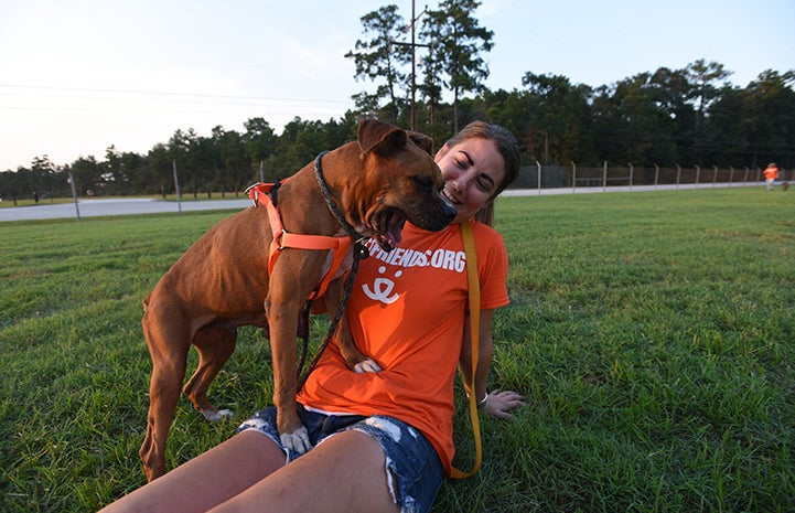 Tierney Sain with Ensure the dog after Hurricane Harvey