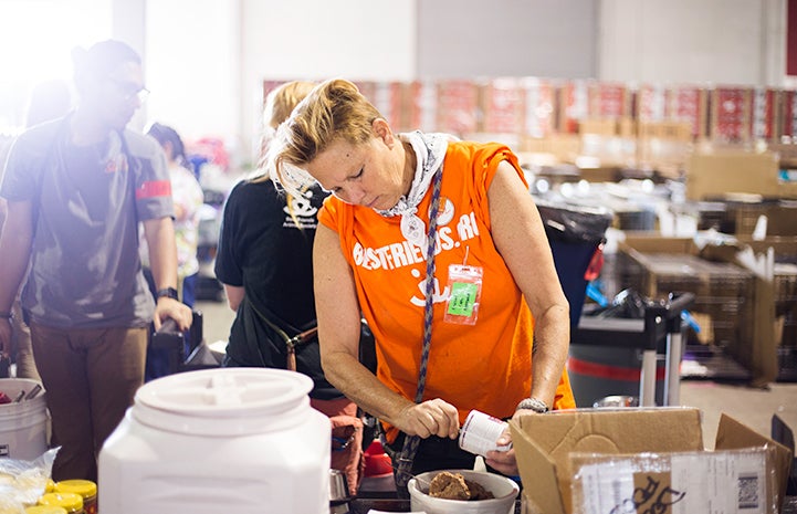 Gail Gallagher helps came to Houston from Delaware to help care for dogs after Hurricane Harvey