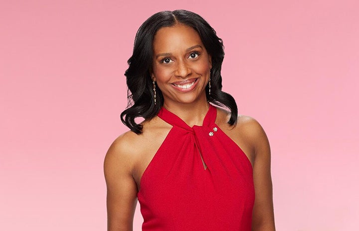 Head shot of Dr. Callie Harris (Foley), DVM smiling and wearing a red top