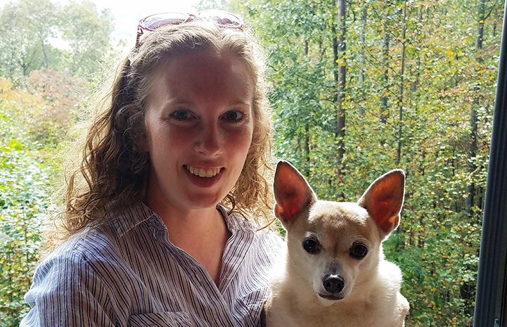 Erin Granados holding Obie her dog