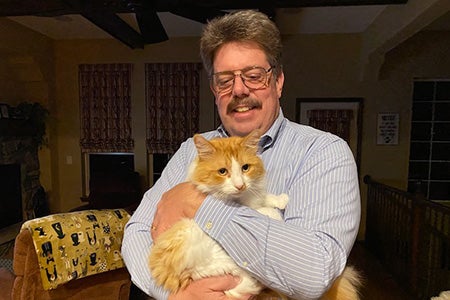 Paul holding ken the cat