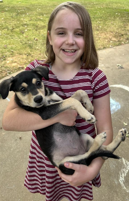 Lindley holding a dog