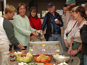  Spencer the dog with his caregivers and staff 