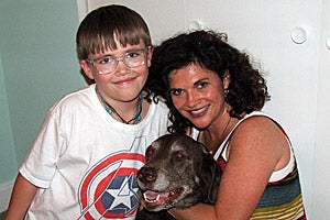 Family with their dog they adopted from the Trolley Square pet adoption center in SLC, Utah