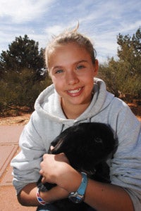 Tatum Godfrey holding a bunny at Best Friends Animal Sanctuary