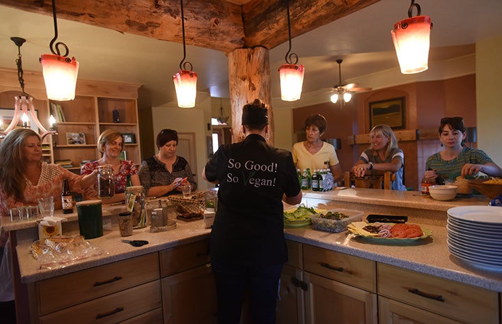 Mindy the chef giving a vegan cooking demonstration