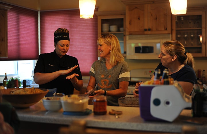 Chef Mindy giving a vegan cooking demonstration