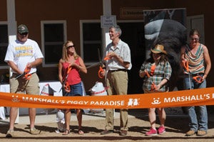 Ribbon cutting at Marshall's Piggy Paradise Grand Opening