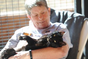 Judie Pursell with Omar the cat at Best Friends in Southern Utah