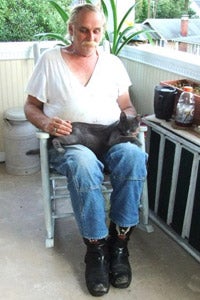 Andy with KeeKee one of the cats helped by Best Friends' Baltimore Community Cats Project