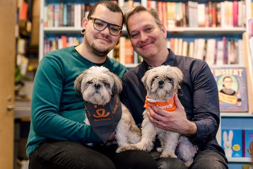 Couple with two small dogs