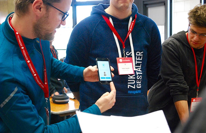 Students showing off their work during the TreeHacks hackathon at Stanford