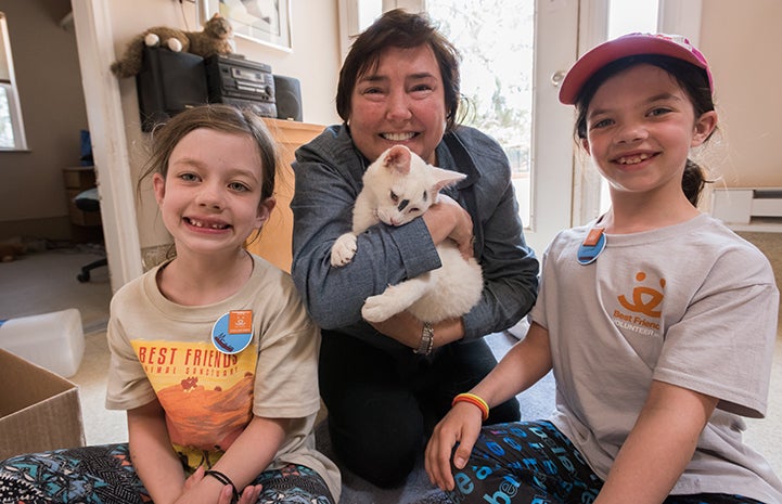 Cookie the kitten and Christina Zimmer, with Lauren and Megan