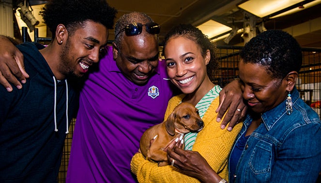 Family with their adopted dog