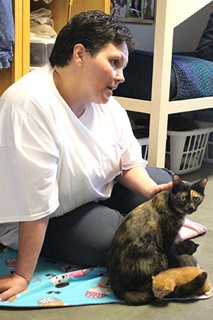 Participant who takes part in the Women Inmate Social Kitty Retreat (WISKR) program