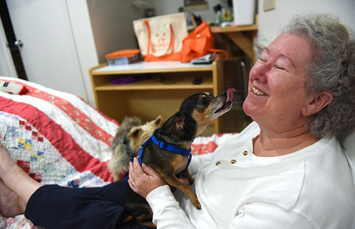 Pepe the dog has become a real cuddle bug with Cathy Calure