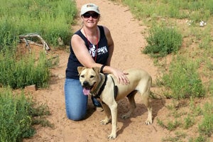 Every year, Wendy returns to the Sanctuary to reunite with her old friend Hurricane Survivor dog Scratch