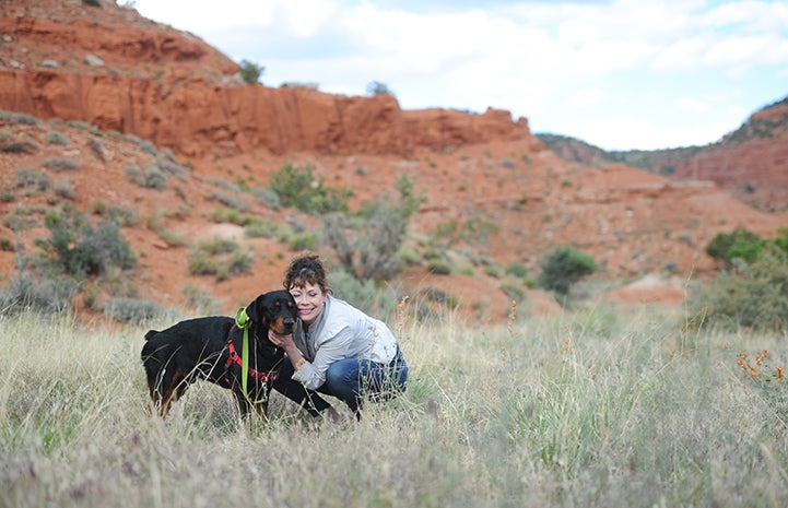 Caryn Rosenthal and Mac the dog enjoy an outing