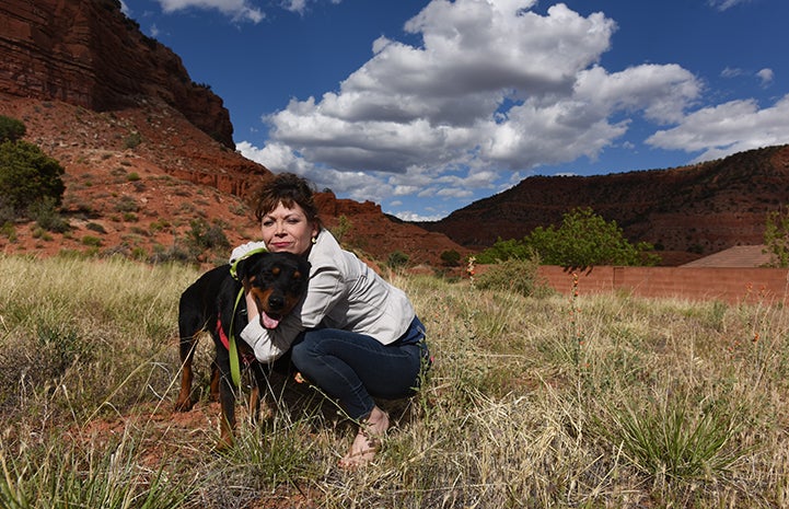 Caryn Rosenthal and Mac the dog taking an outing