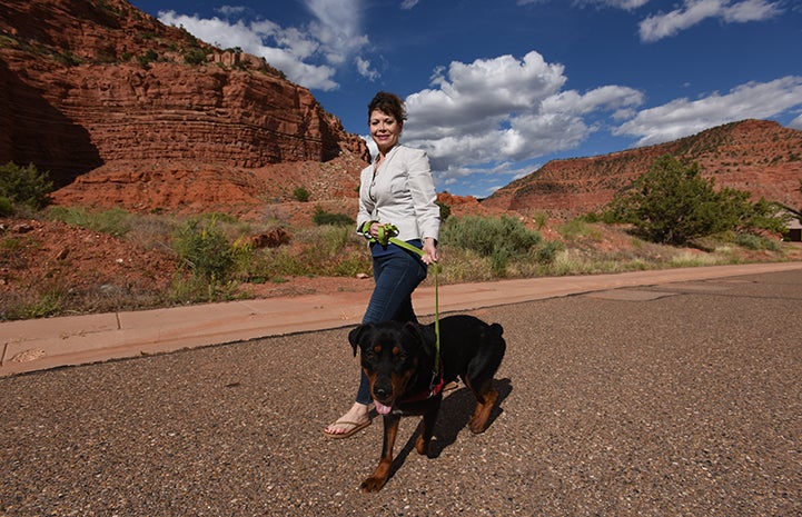 Caryn Rosenthal and Mac the dog taking a walk