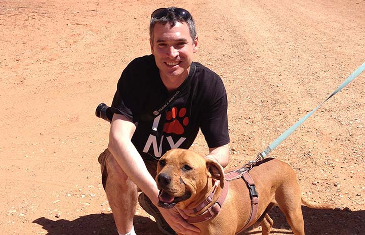 Volunteer Dale Musselman with Lucas the Vicktory dog