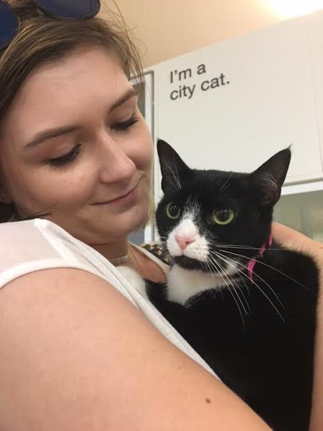 Woman with a tuxedo cat