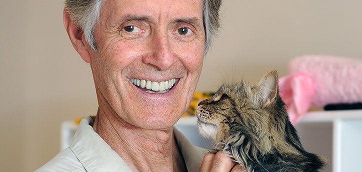 Gregory Castle, former CEO of Best Friends, and cat. Best Friends is continually working to build and support a successful animal coalition.