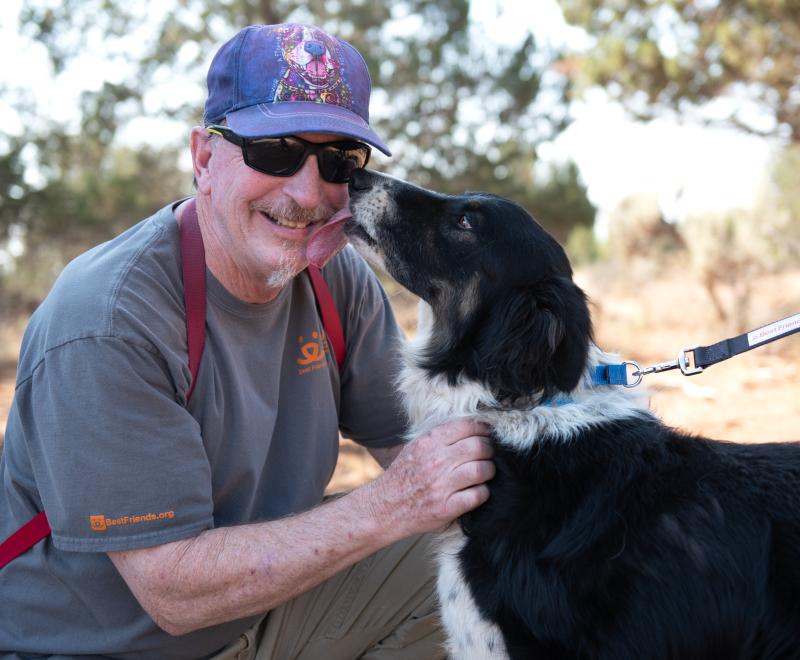 Sego the dog kissing Richard Garrett's face