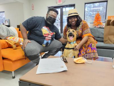 Couple adopting Mila the dog