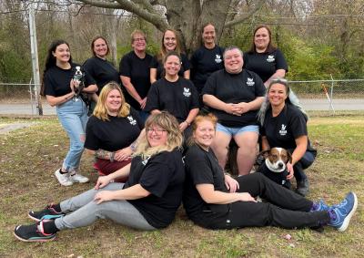 BAHS staff photo with two dogs