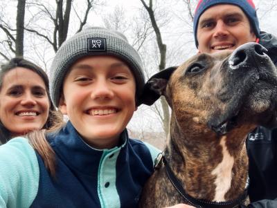 Bluto the dog with his family