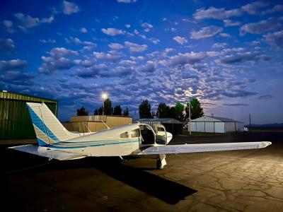 The airplane used for the transport with the sky at dusk or dawn