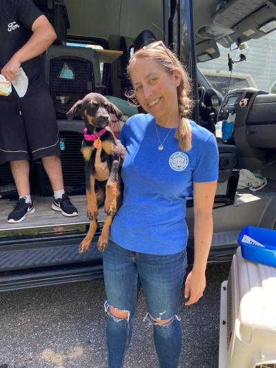 Jenny Franz holding a puppy