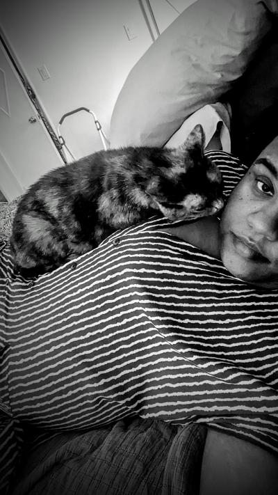 Black and white selfie of Pumba the cat with Gabrielle Williams