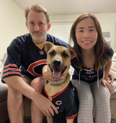 Jessie and her husband with Maggie, the first dog they fostered (and then adopted)