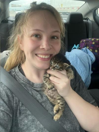 Emily holding Flabbergast the kitten