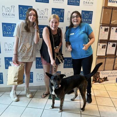 Family of three with the dog they're adopting from MSPCA–Angell