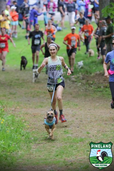 Maureen Gillespie running in a race with her dog