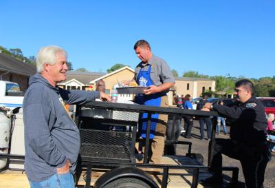 People participating in the Pancakes and Puppies fundraiser