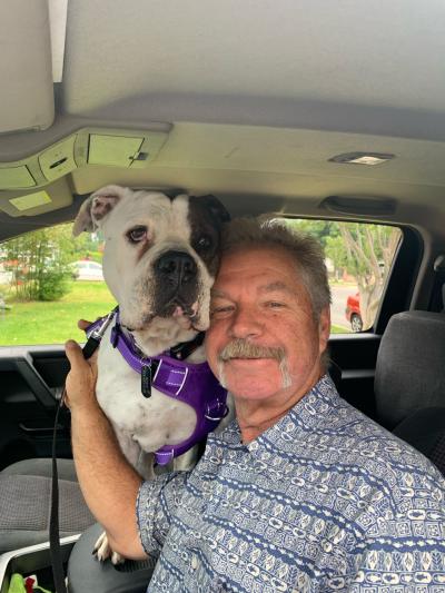 Baby with her adopter in a vehicle