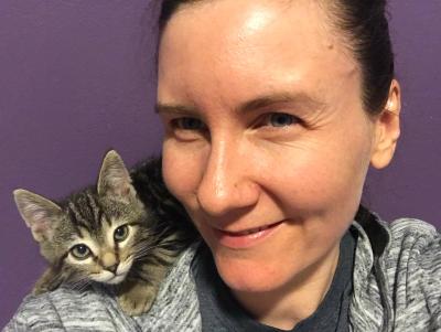 Lizel Allen with a foster kitten on her shoulder