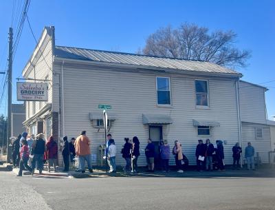 People standing in line at the Saleeba’s Store of Hope pet food pantry