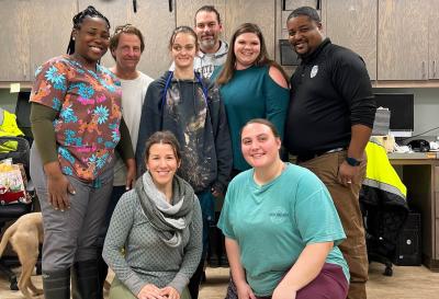 Pine Bluff Animal Control staff posing with Cathy Overfield