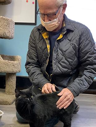 Jud Munro with his cat Junior