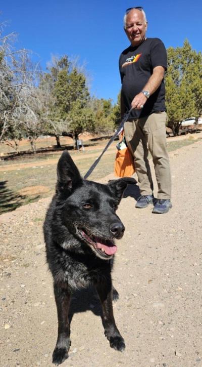 Casey with Vito the dog on a leash