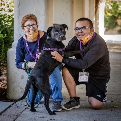 Ginny and Kenny Popvich with Leopold the dog